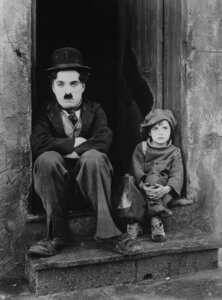 Wandbild / Kunstdruck / Poster / Leinwand - Charlie Chaplin und Jackie Coogan - Photocircle